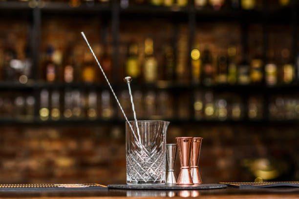 istock A glass and measuring cup for making drinks and cocktails in a pub, bar. 1310412975