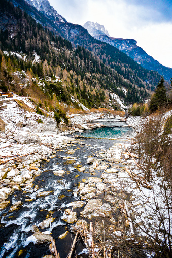 A mountain stream flowing in the Italian Dolomites.