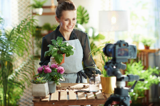 istock happy female records gardening educational video tutorials 1310418392