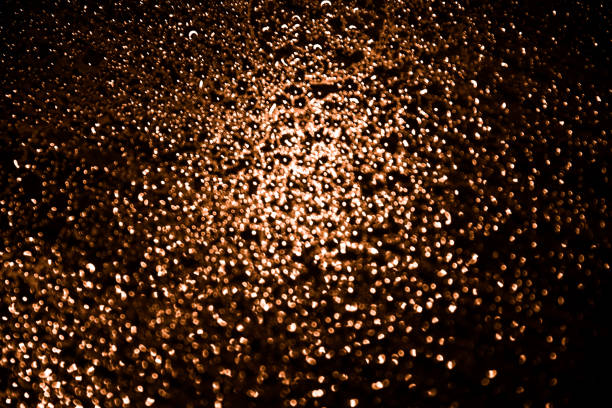 istock abstract orange background, raindrops close-up 1310419342