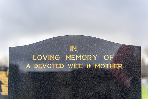 Gravestone inscription for mother wife