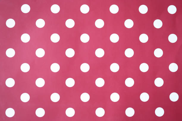 istock Red background with white circles. Polka dot closeup 1310422798
