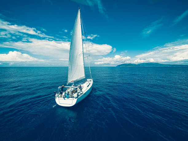 Sailing with sailboat, view from drone