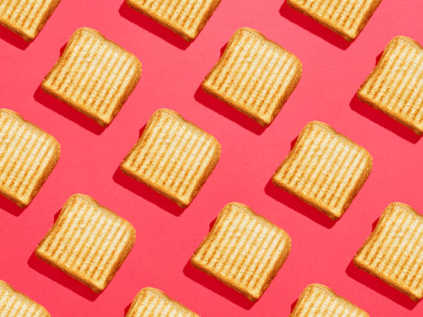 istock Toasted sandwich pattern on pink background, from above, hard shadow 1310424263