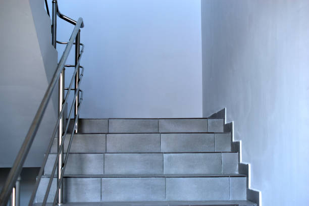 istock A landing with a staircase and a shiny railing 1310427566
