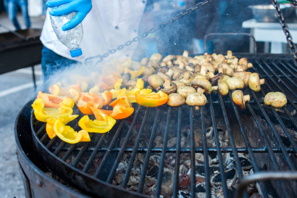 istock cooking vegetables and mushrooms on an open fire 1310435476