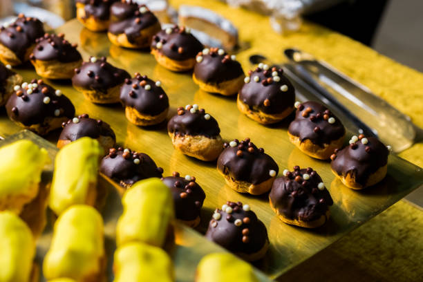 istock Chocolate cakes in the glaze on the table 1310435532