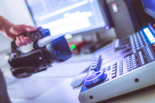 istock Professional cutting room for video editing and video producing: Monitors, camera and sound mixing 1310441045