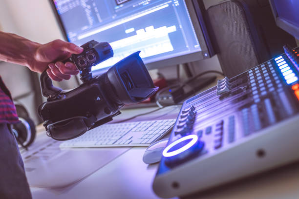 istock Professional cutting room for video editing and video producing: Monitors, camera and sound mixing 1310442257