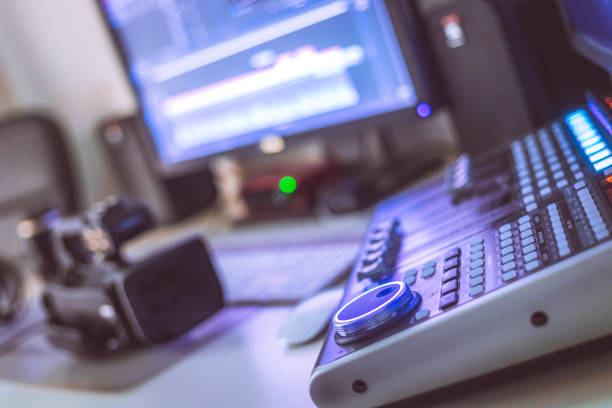 istock Professional cutting room for video editing and video producing: Monitors, camera and sound mixing 1310442784