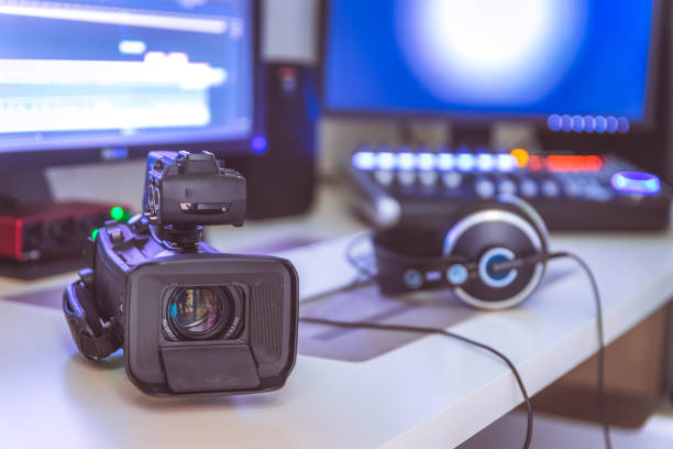 istock Professional cutting room for video editing and video producing: Monitors, camera and sound mixing 1310443606