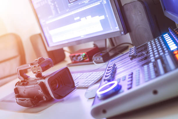istock Professional cutting room for video editing and video producing: Monitors, camera and sound mixing 1310443829