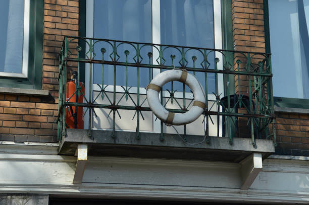 a safety ring or lifesaver ring hanging on a balcony