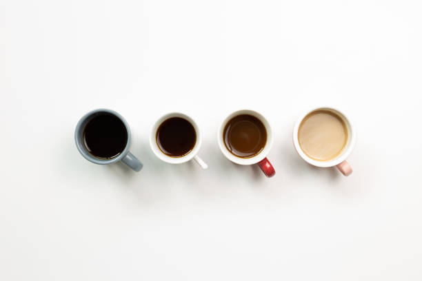 istock Various cup of coffee on white background. top view, copy space 1310447528