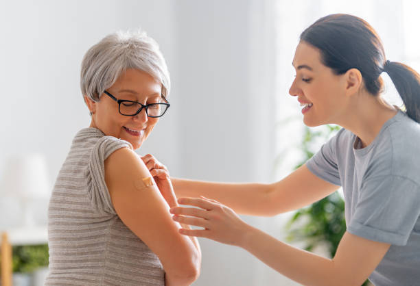 istock Senior woman after vaccination. 1310447603
