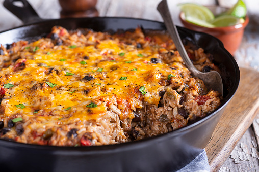 Southwestern Shredded Chicken Skillet with Rice, Black Beans, Tomato and Cheese