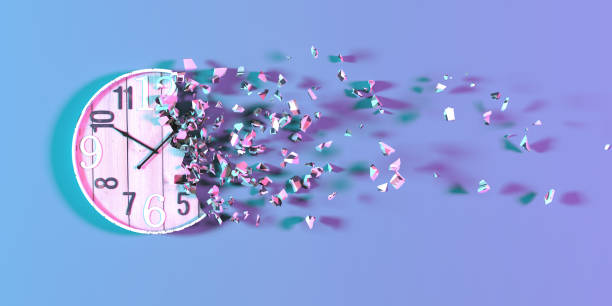 istock wall clock in neon light falling apart into small parts 1310448908