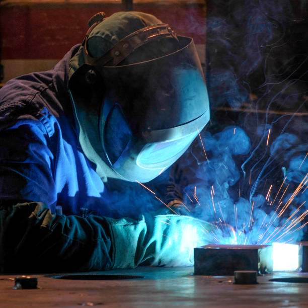 istock industry - worker in action with protection 1310453360