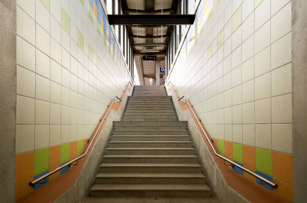 istock stairs in a tunnel to the top 1310453723