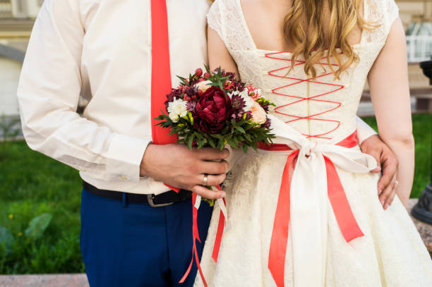 istock bridal bouquet in the hands of 1310455309