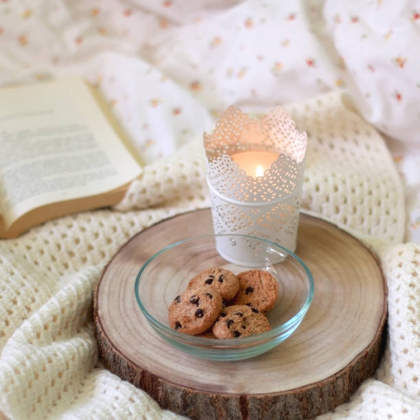 istock Cookies, Candle and Book 1310455875