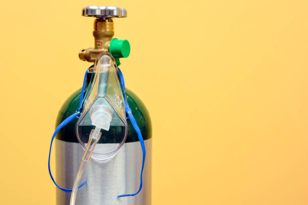 istock Medical Oxygen Mask on Oxygen Tank 1310457530