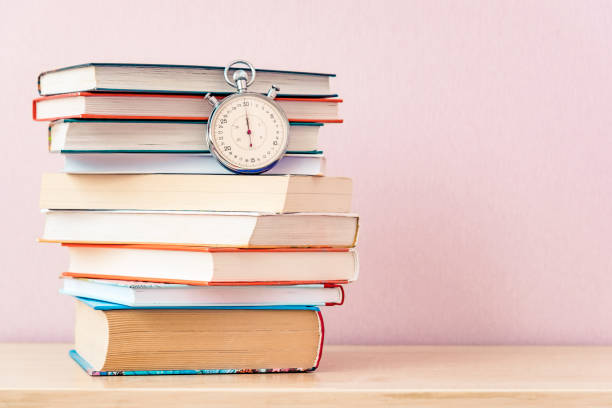 istock Many old books on bookshelf on simple backdrop. Copy space for your text. 1310462338