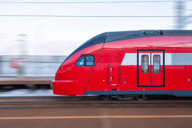 istock Suburban train passing at high speed, side view. 1310463554