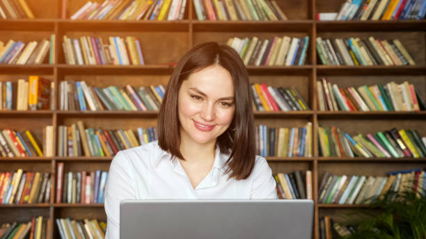 istock Young freelancer talks and nods at online job interview 1310463613
