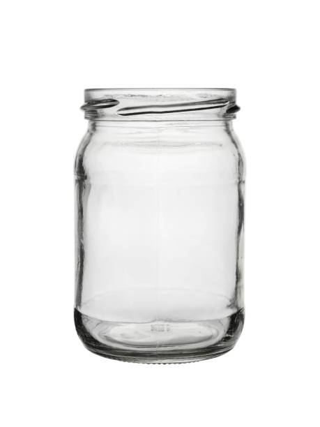 istock Glass, empty jar on a white background, close-up 1310467452