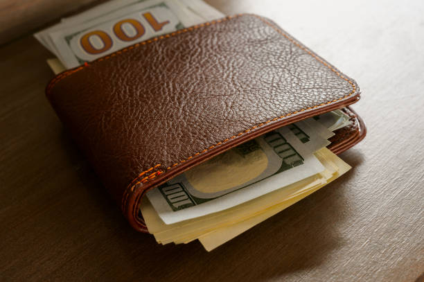 istock Dollars in the men's purse 1310469634