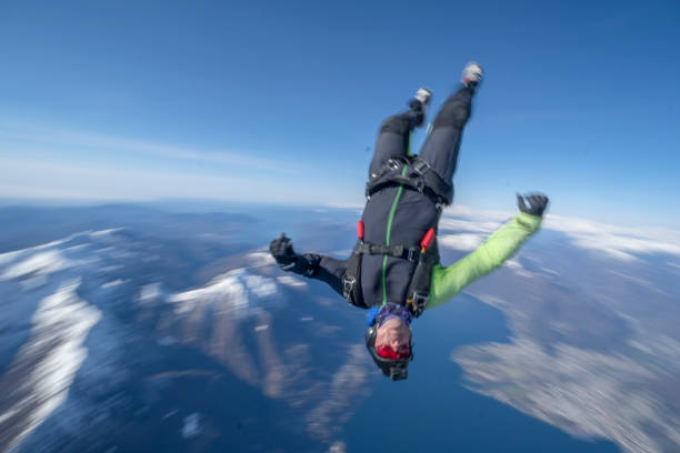 istock Freefall jumper soars above Swiss mountain landscape 1310472240