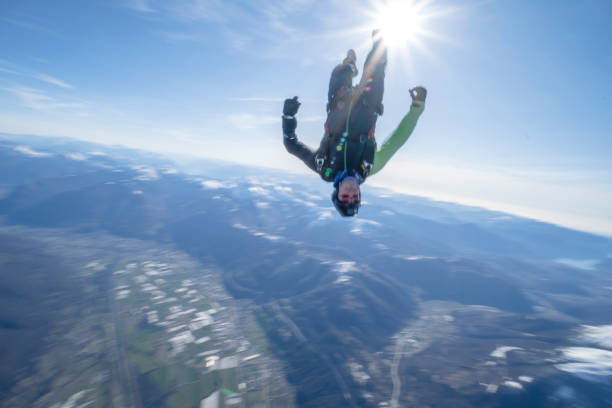 istock Freefall jumper soars above Swiss mountain landscape 1310472243