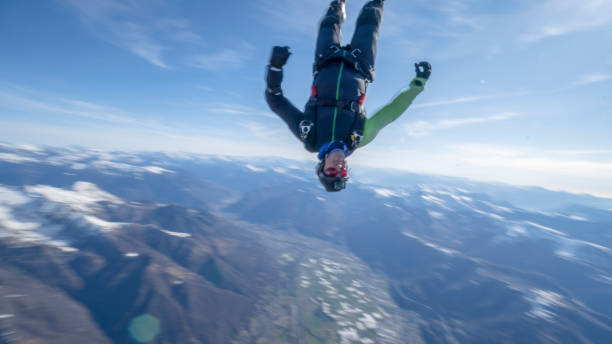 istock Freefall jumper soars above Swiss mountain landscape 1310472244