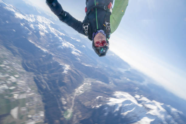 istock Freefall jumper soars above Swiss mountain landscape 1310472266