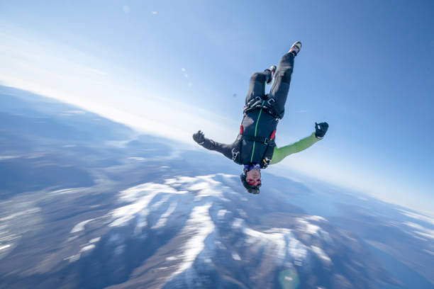 istock Freefall jumper soars above Swiss mountain landscape 1310472290