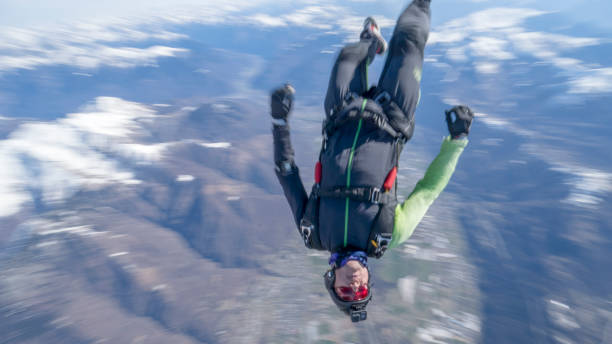 istock Freefall jumper soars above Swiss mountain landscape 1310472292