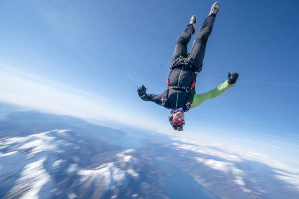 istock Freefall jumper soars above Swiss mountain landscape 1310472304