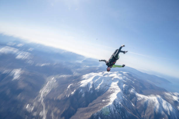 istock Freefall jumper soars above Swiss mountain landscape 1310472318