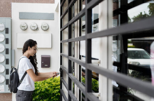 istock Store female owner opening door 1310472605