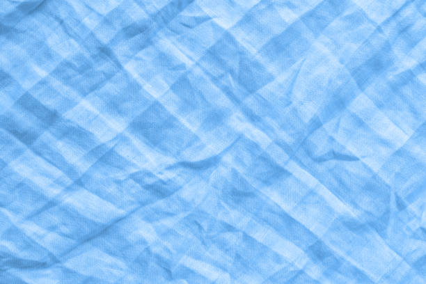 istock Beautiful texture of blue linen fabric, wrinkle effect 1310473006