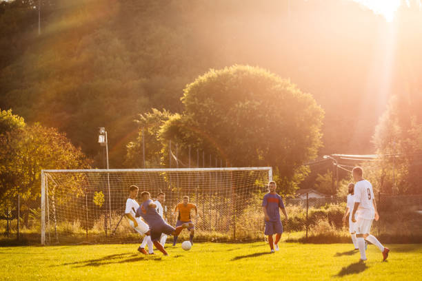 istock Soccer players playing football 1310474085