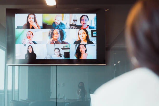istock Unrecognizable woman attends meeting with remote workers 1310474252