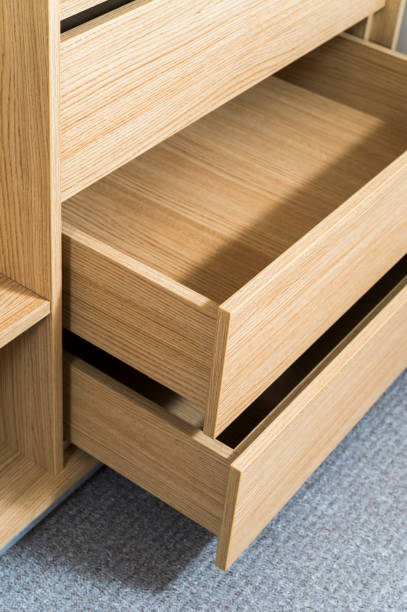 istock wooden wardrobe with open drawers for things 1310474901