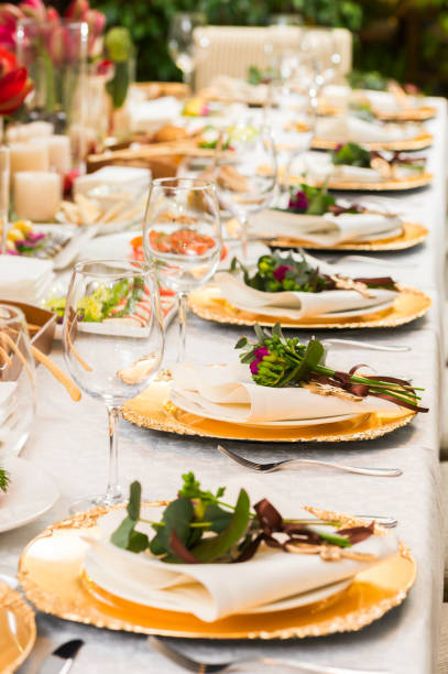 istock Decorated plates on the banquet table 1310474948