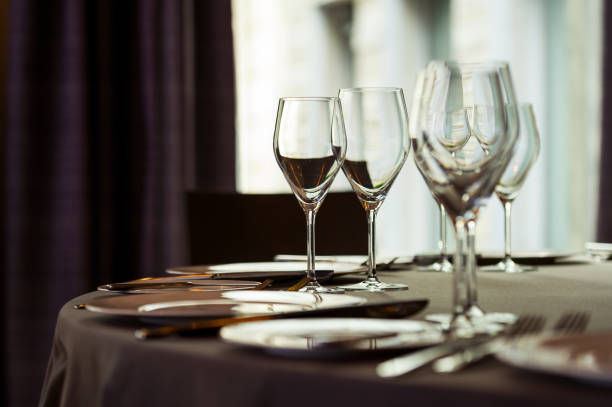 istock Glasses for wine on the window background, selective focusing 1310475008