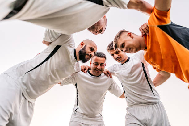 istock Soccer players huddling before game 1310475404