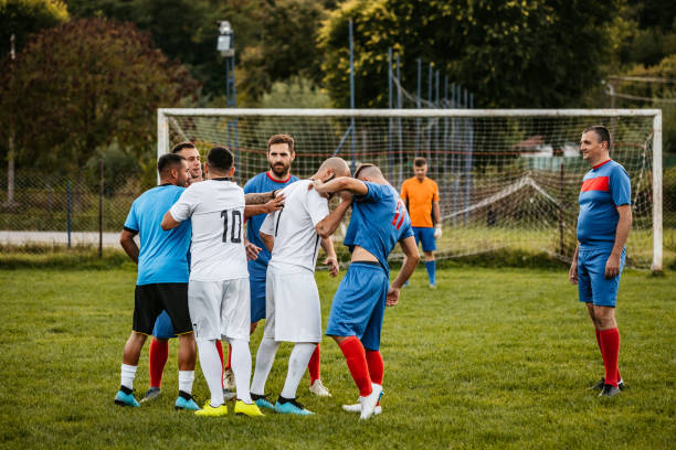 istock Soccer players having a conflict on field 1310476111