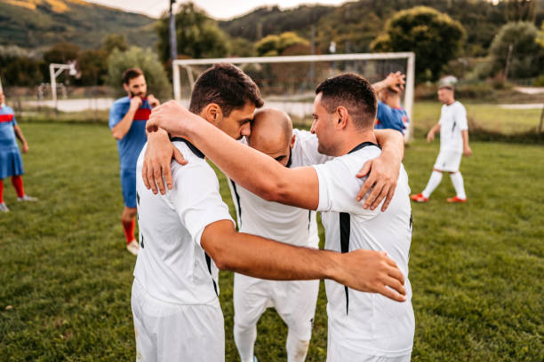 istock Soccer players  celebrating a goal 1310476246