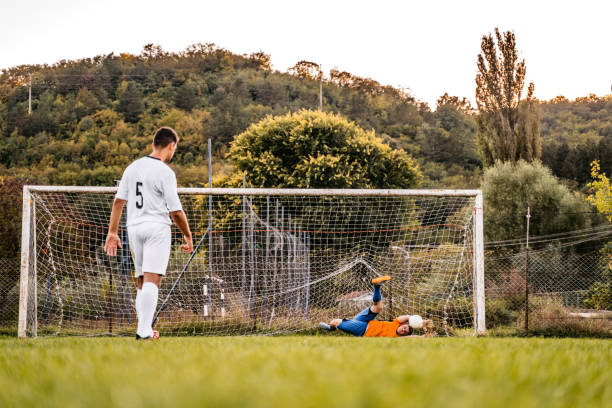 istock Soccer player taking penalty kick 1310476463
